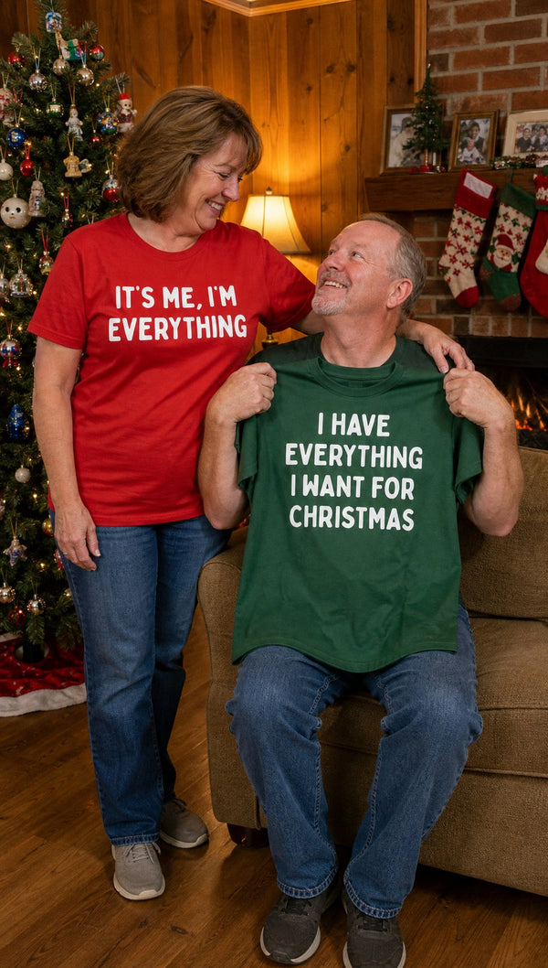 A couple in their living room with the matching tees