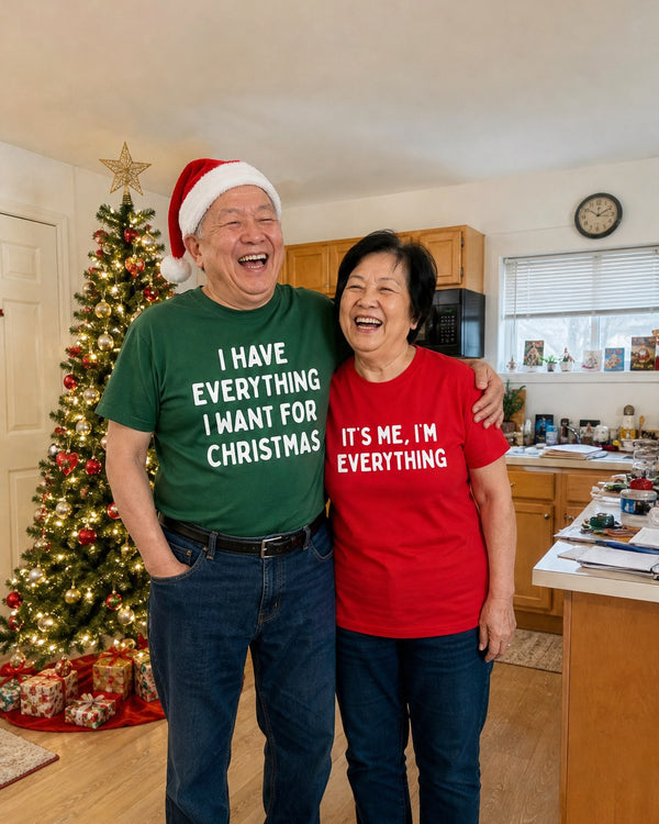 An older couple wearing the matching tees in their kitchen